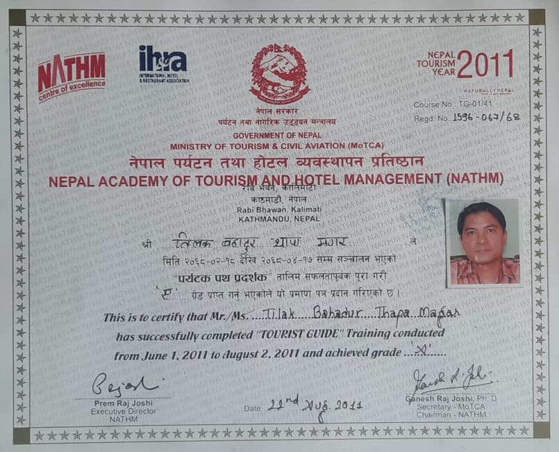 An official Tour Guide License, issued to Tilak by NATHM (Nepal Academy of Tourism & Hotel Management), symbolizing his certified expertise and authority to lead tours in Nepal.