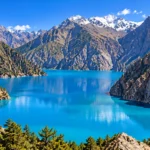 Phoksundo Lake surrounded by snow-capped mountains in Nepal